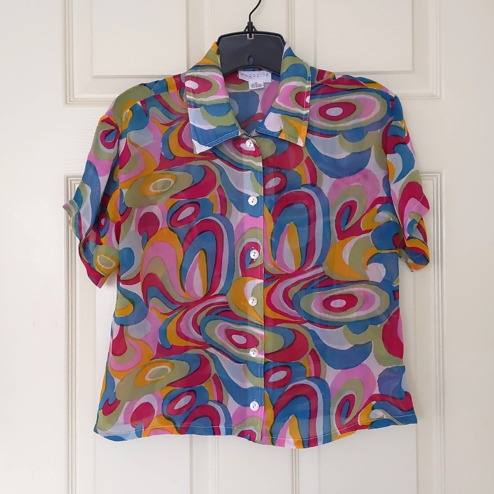 NWOT. 100% Rayon Short Sleeve Sheer Shirt with multi color patterns.